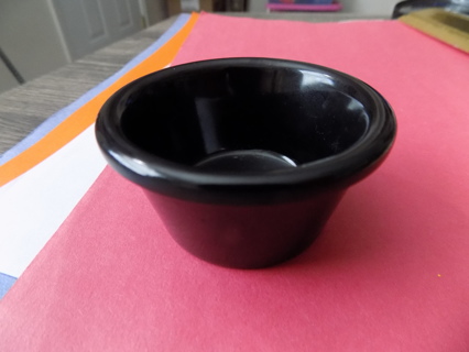 2 1/2 round and 1 1/2 tall black melamine condiment dish