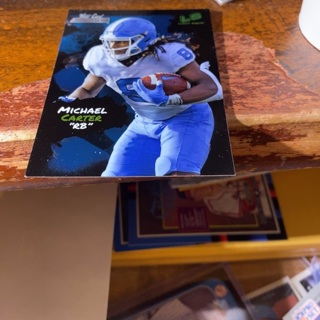 2021 wild card allumination light show Michael carter football card 