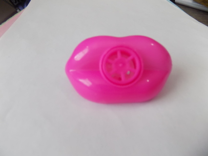 Set of pink lip shaped whistle