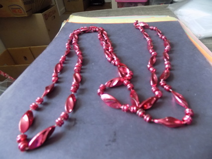 Necklace long strand pink twisted bead with pairs of 2 round separtor beads between them