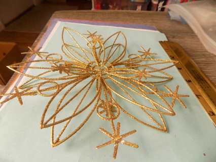 6 inch tall and wide golden wire starburst glittery ornament