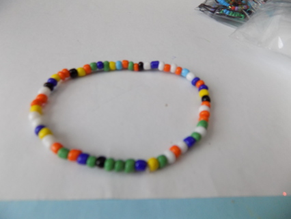 Bracelet E Beads multi color green orange white dark and light blue