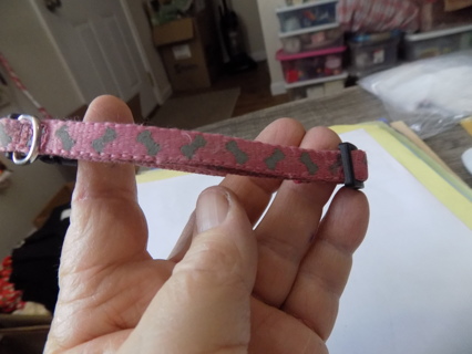 Pink dog collar with blue bones print for a small dog