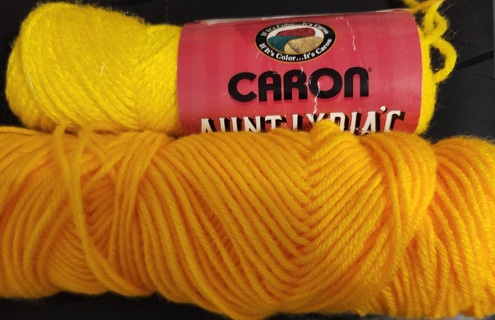 Lot of 2 - Gold / Yellow Yarns - total weight is 4 ozs