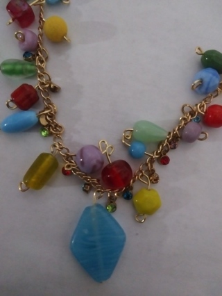 Handmade necklace. Gold tone, lampwork beads, colored rhinestones. Long, no clasp.