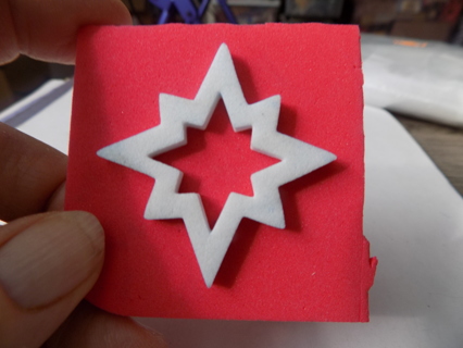 2 inch foam starburst foam stamp red background