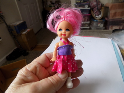 Kelly Doll Barbie's little sister hot pink hair purple pink dress, polka dots white socks, shoes