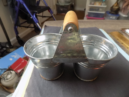 Double galvinized mini buckets attached together with wood handle 6 in wide