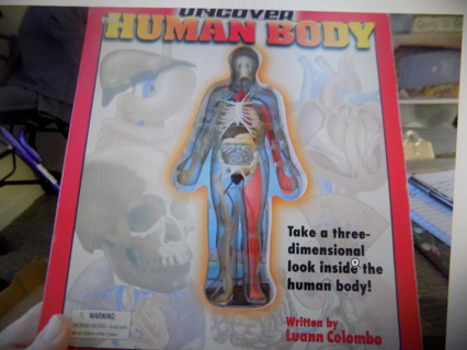 The Human Body book. A 3 D layered look of our Human insides