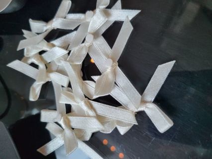 13 off white- string bows- for sewing crafts- sml- see all pics