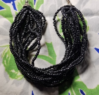 BRACELET BLACK CORAL BEADS EIGHT INCHES LONG OH SO BEAUTIFUL AND A STEAL OF A DEAL.