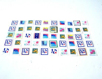 Non-Profit Org Postage Stamps used set of 50 still on paper