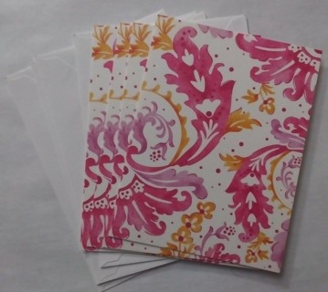 4 cards with envelopes, paisley like print. Blank inside.