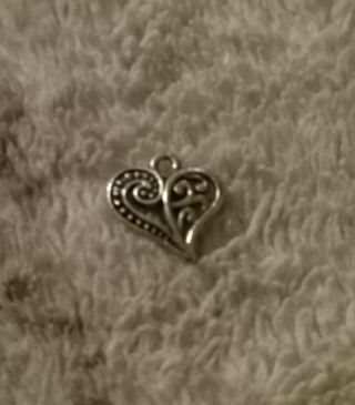 Heart tribel like inside desigbed charm