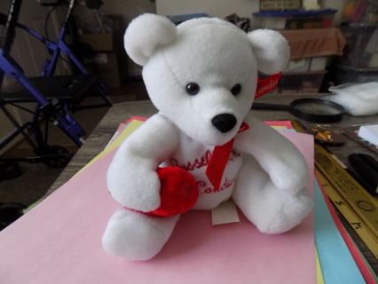 Russell Stover I Love Chocolates white bear plush holds red heart