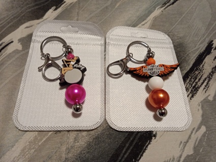 2 New Keychains - Miley Cyrus + Harley Davidson 