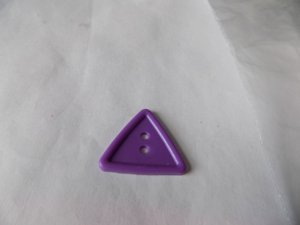 Large purple plastic triangle button