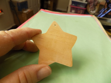 Wooden cut out star ornament ready to paint