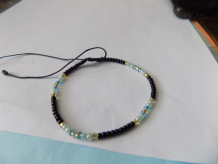 Bracelet E beads black, blue, gold