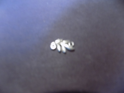 Silvertone leafy branch charm with 2 loops