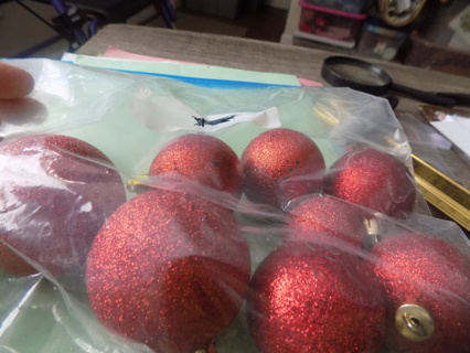 Set of 8 red glittery different size round vintage ornaments