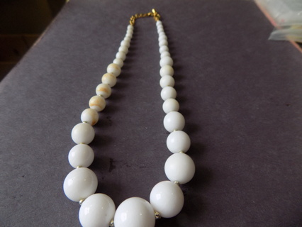 Necklace white and tan marbled graduating size beads