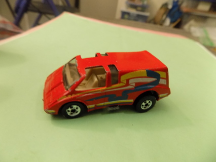Red Hot Wheels van with yellow, blue and white stripes