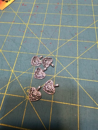 5 small heart charms 