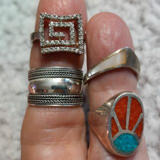 4 sterling silver rings size approx 6