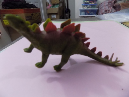 5 inch stegosaurs dinosaur green with red fins