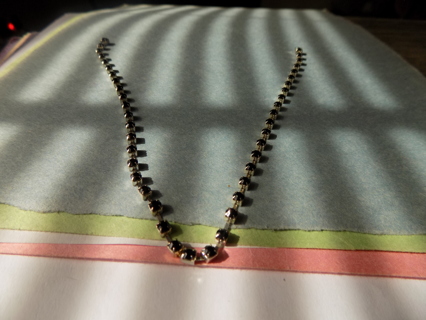 Vintage 12 inch long strand of black rhinestones