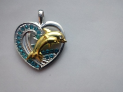 Heart with blue jems & 2 gold plated dolphins over stainless steel 