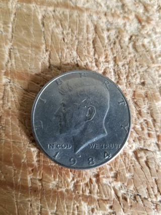 1984 D KENNEDY HALD DOLLAR COIN