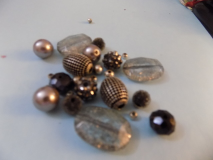 Small bag assorted black, silver, faceted, flat and jewel covered beads for jewelry making