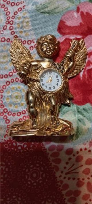 Xanadu Quartz Golden Standing Angel Clock