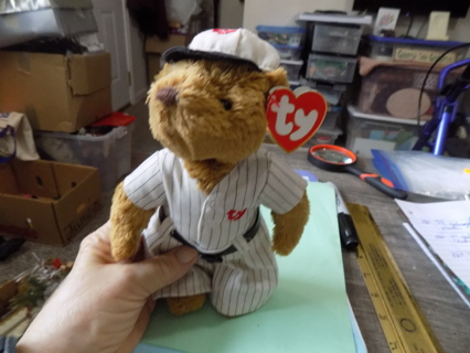 TY Cooper the baseball bear has heart and tushtag attached