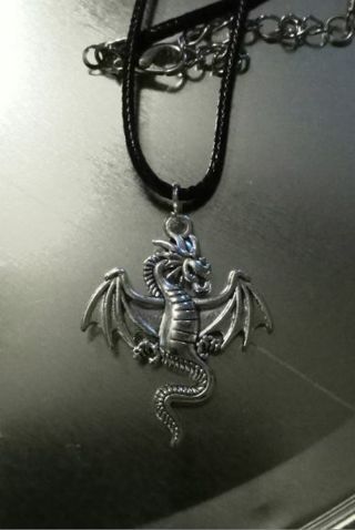 Dragon Charm necklace charm is around 2" big