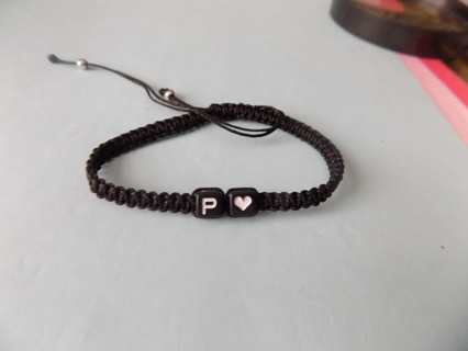 black adjustable cord bracelet 2 black beads 2 has heart the other initial P