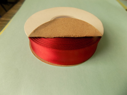 Large spool of wide red satin ribbon new