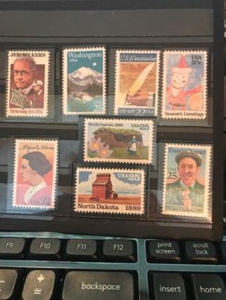 8 US MNH in mounts single stamps..use sell or trade