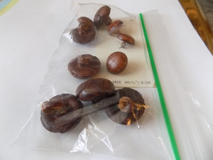 Baggie of brown leather covered buttons