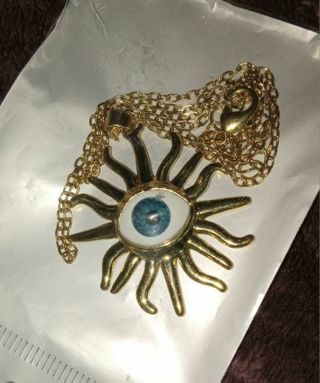 Gold Sun blue eye big charm necklace nip