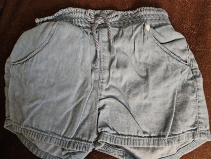 Light blue denim-like shorts