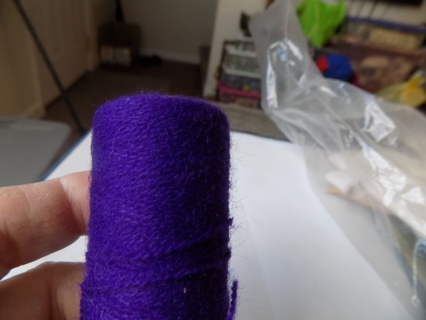 New roll dark purple punch craft yarn