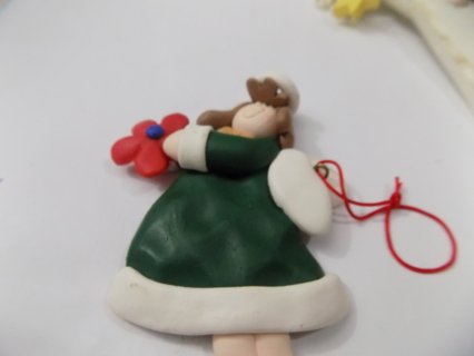 5 inch polymar clay angel ornament green fur trim gown holds red flower, brown hair