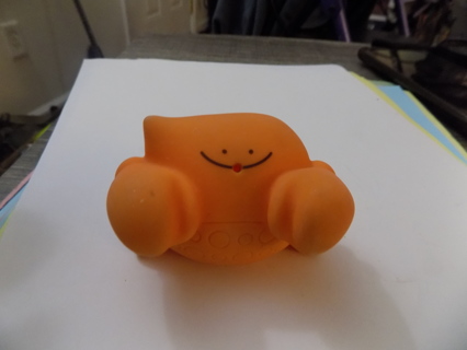 orange hard rubber crab toy