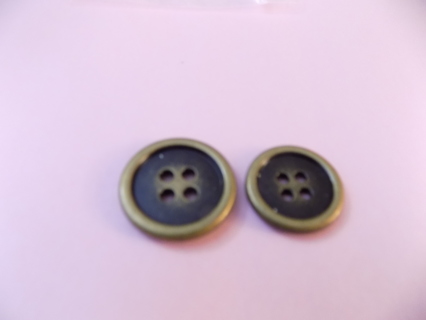 Pair of large round brass buttons