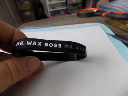 black rubber bracelet Mr. Wax Boss in white and gray letters