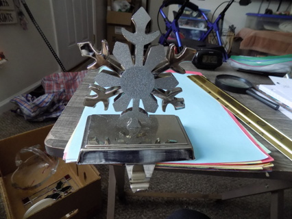 5 inch tall metal 3D snowflake on base stocking holder