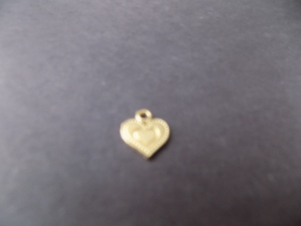 goldtone heart charm with dotted border and another etched heart inside